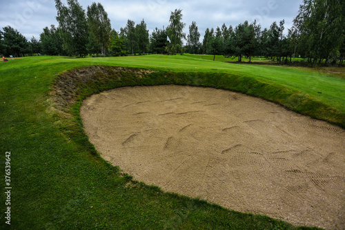 Playing golf. Golf course and Bag