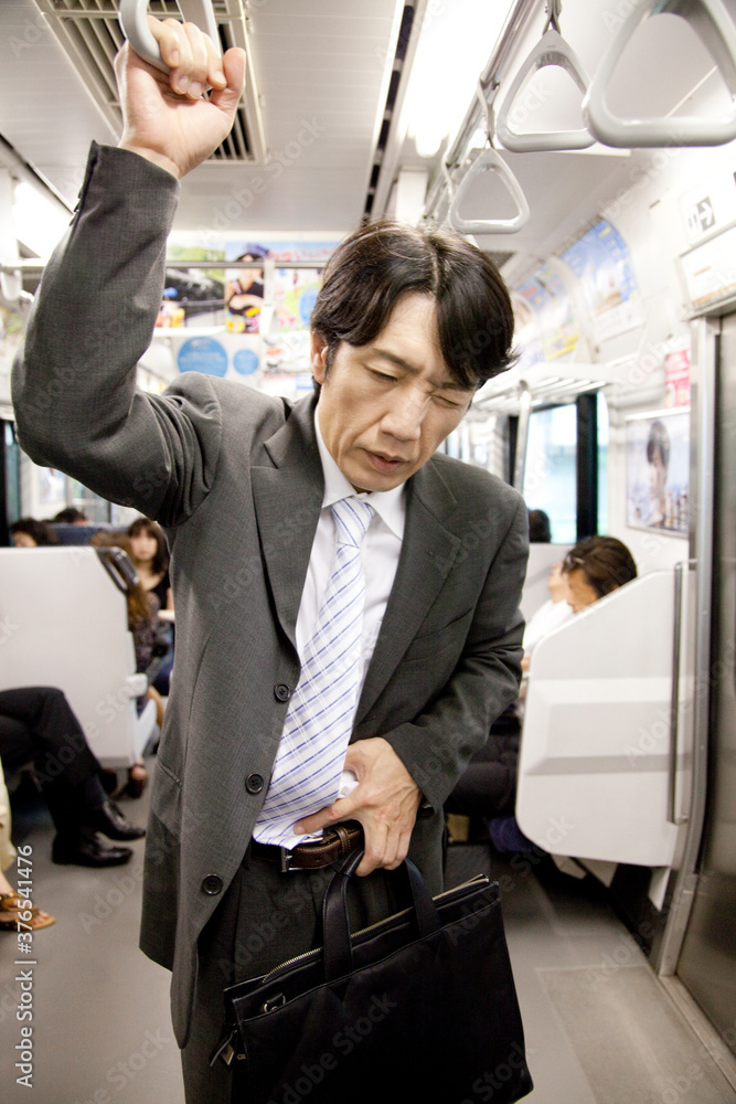 体調不良のビジネスマン 体調不良のビジネスマン