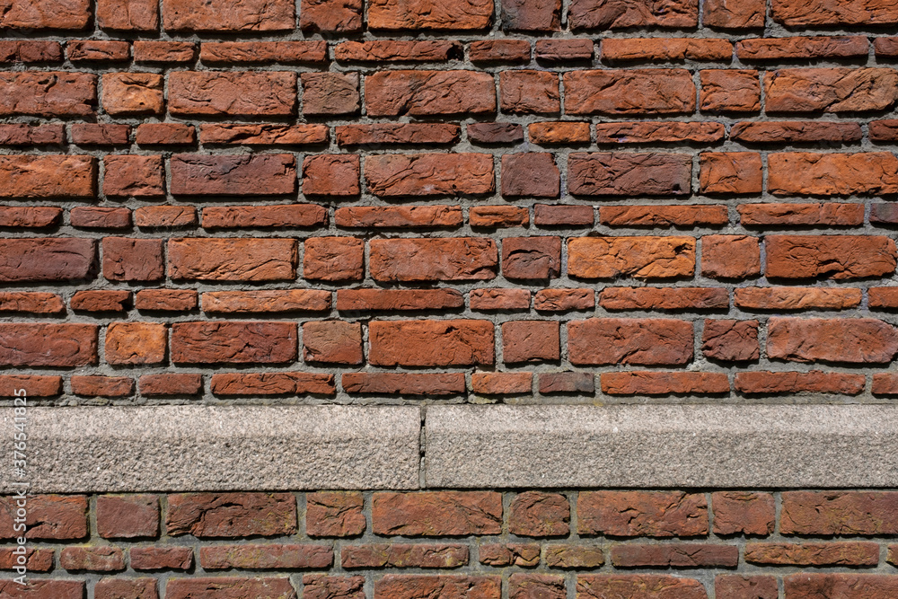Obraz premium Background of old vintage dirty brick wall with peeling plaster