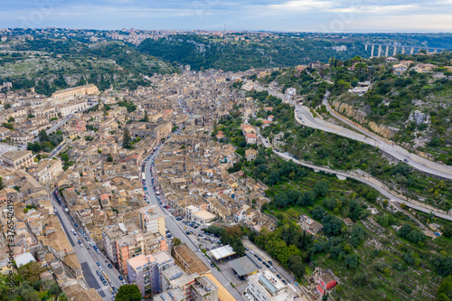 Aerial view of Modica, Sicily, Italy. Modica (Ragusa Province), view of the baroque town. Sicily, Italy. Ancient city Modica from above, Sicily, Italy © daliu