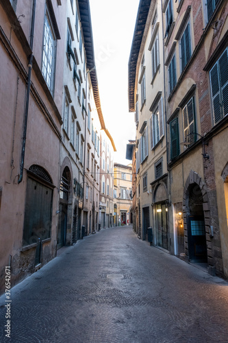 Narrow alley in tuscan village. antique italian lane  Tuscany  Italy