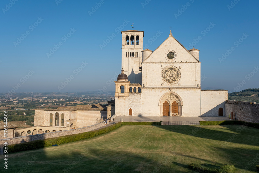 View of Assisi and the old church in the early morning, Italy