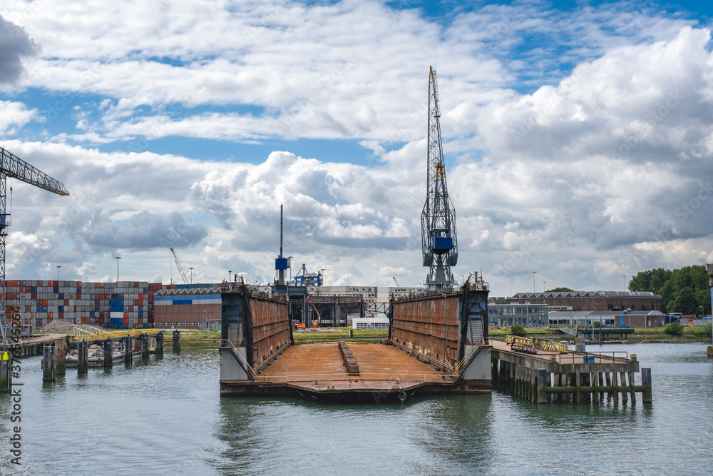 Floating dry dock with cranes in the port of rotterdam, the Netherlands