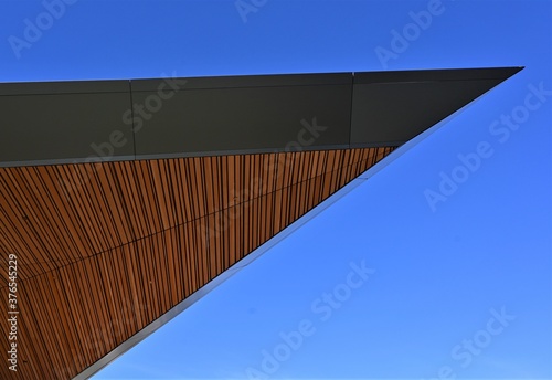 Architectural awning, woodwork with blue sky