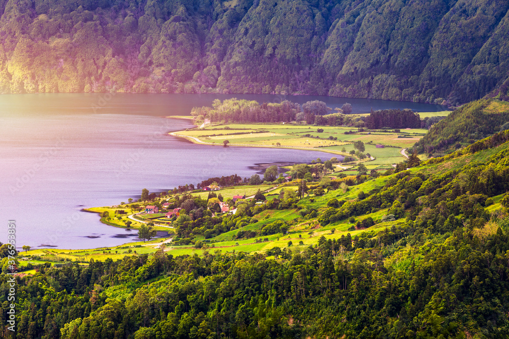 Naklejka premium Traditional houses, Sete Cidades, Sao Miguel Island, Azores. Beautiful view of Sete Cidades village in Sao Miguel Island, Azores, Portugal.