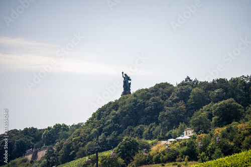 view on niederwald monument statue representing unification of germany in ruedesheim, rhine valley, germany