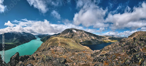 Obraz na plátně ultra wide panorama of the besseggen ridge trail over the gjende lake cliff on t
