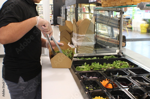 Deli Worker Prepping Salad