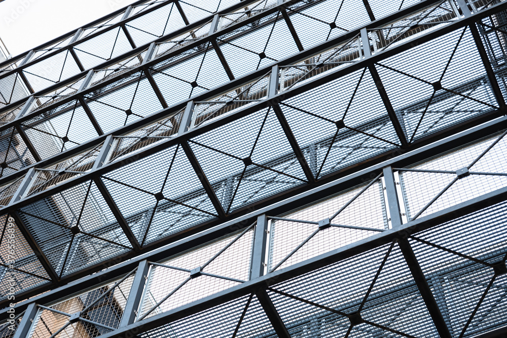 Fototapeta premium Metal mesh on steel walkways between buildings to communicate.