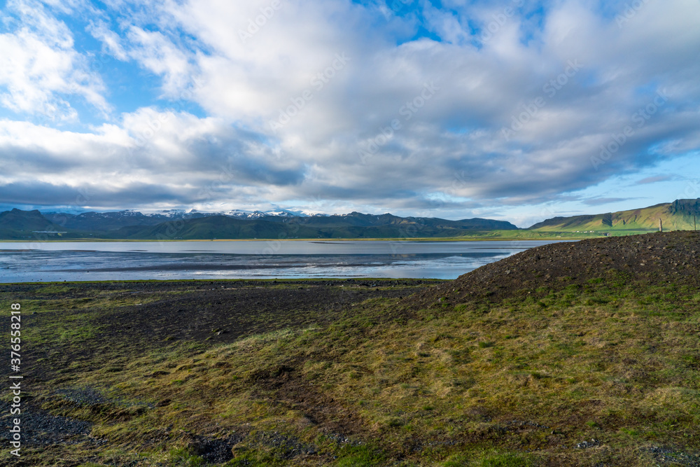 Gravel and mountain coastline in Iceland Gravel and mountain coastline in Iceland