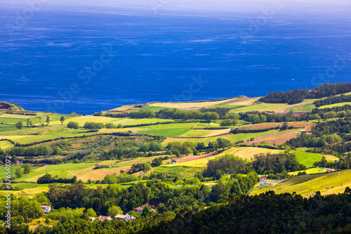 Azores panoramic view of natural landscape  wonderful scenic island of Portugal. Beautiful lagoons in volcanic craters and green fields. Tourist attraction and travel destination. Azores  Portugal.