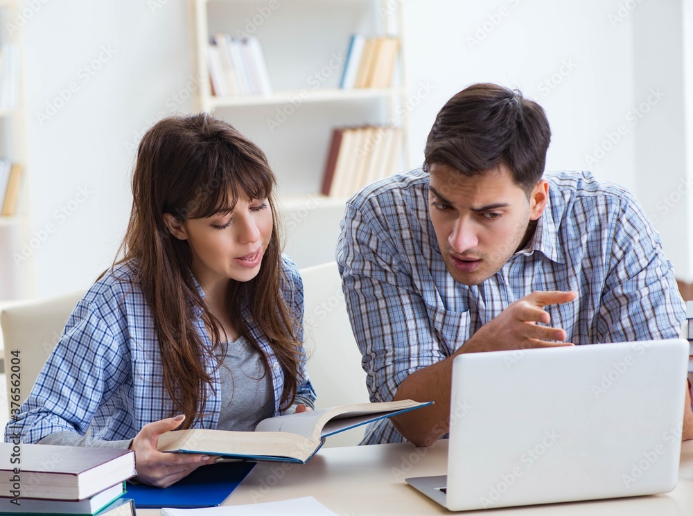 Students sitting and studying in classroom college Students sitting and studying in classroom college