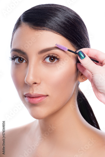 Eyebrow correction procedure for the smiling model with long eyelashes