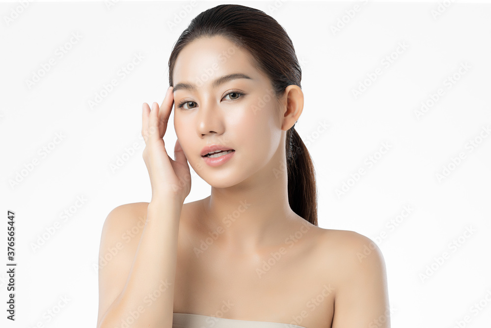 Beautiful Young asian Woman with Clean Fresh Skin on white background, Face care, Facial treatment, Cosmetology, beauty and spa, Asian women portrait Beautiful Young asian Woman with Clean Fresh Skin on white background, Face care, Facial treatment, Cosmetology, beauty and spa, Asian women portrait