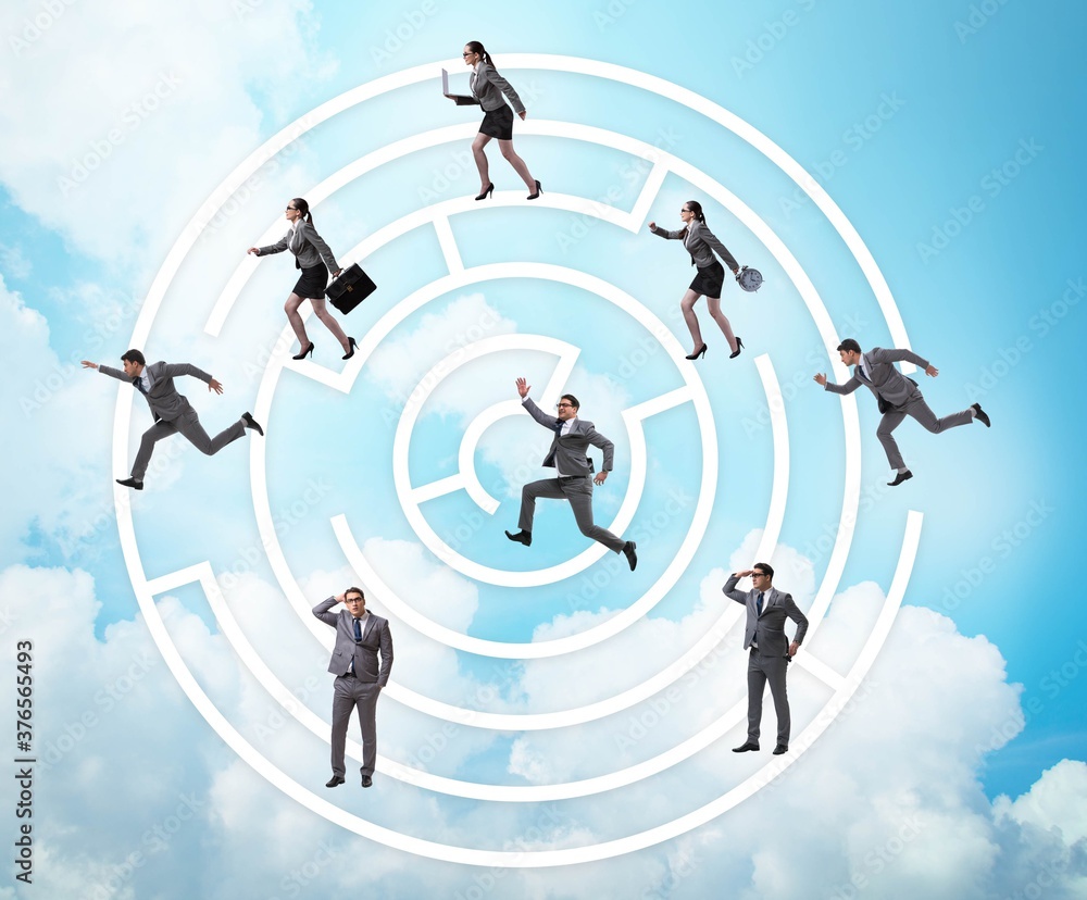 Business people getting lost in maze uncertainty concept Business people getting lost in maze uncertainty concept