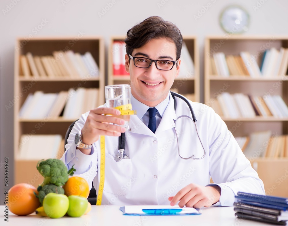 Scientist studying nutrition in various food Scientist studying nutrition in various food