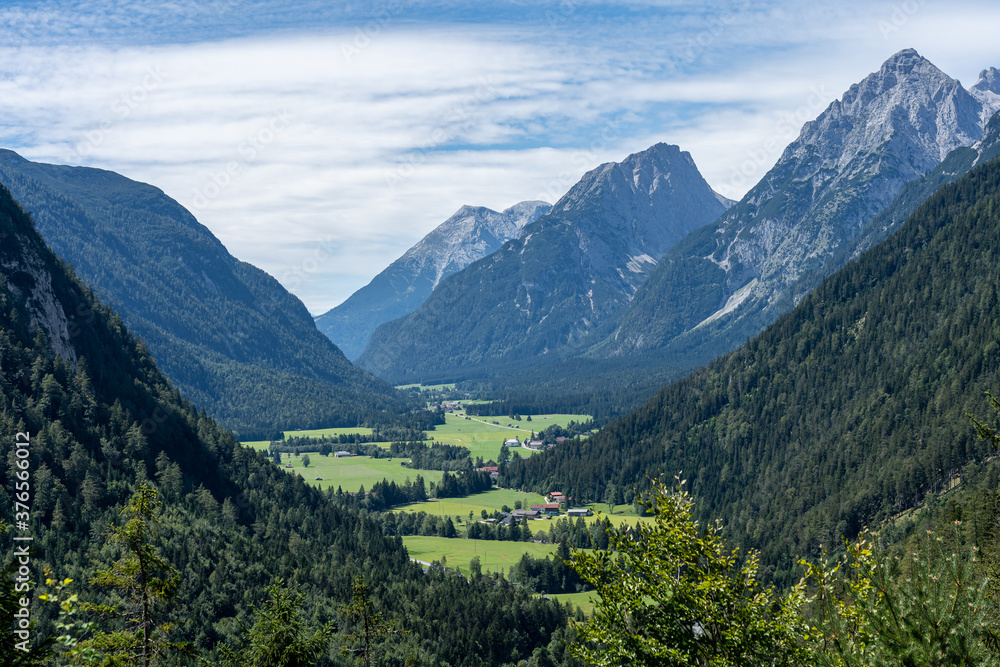 view on wetterstein mountains and leutasch valley from ederkanzel guest court restaurant in summer
