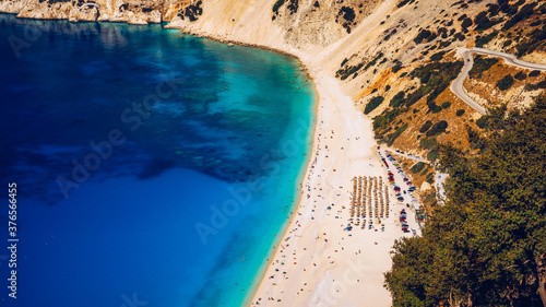 Famous Myrtos beach from overlook, Kefalonia (Cephalonia), Greece. Myrtos beach, Kefalonia island, Greece. Beautiful view of Myrtos beach, Ionian Island, Kefalonia (Cephalonia), Greece.