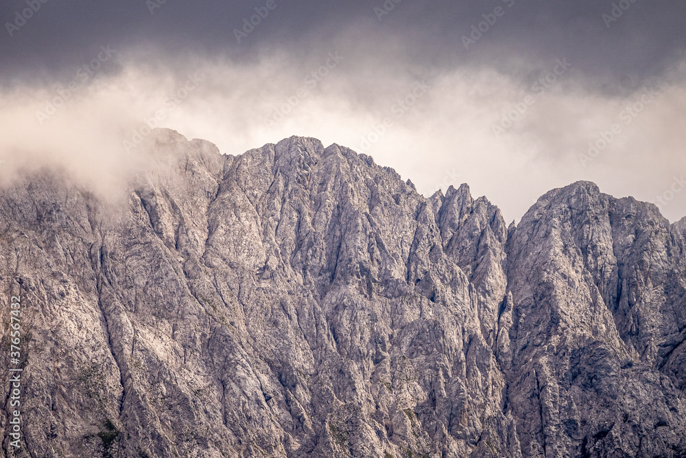 mountain panorama of the karwendel mountains with clouds photo taken at the barmsee mountain panorama of the karwendel mountains with clouds photo taken at the barmsee