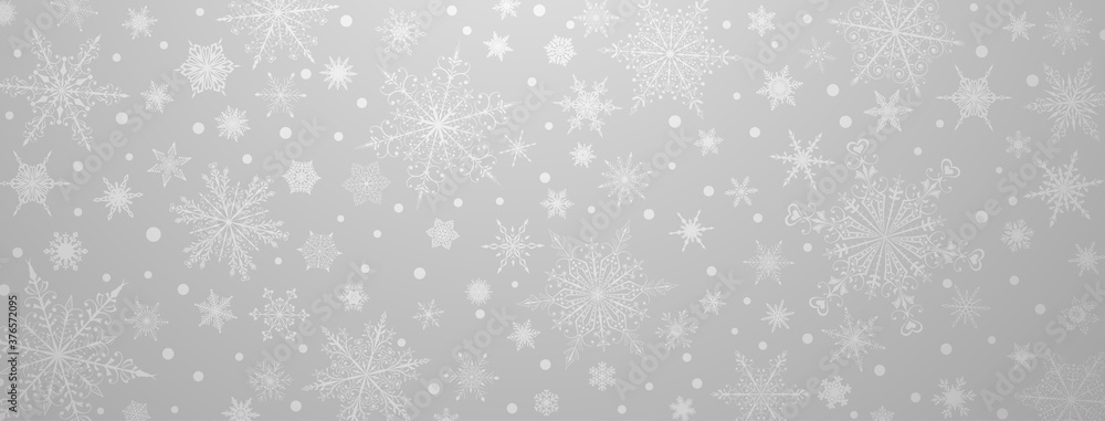Christmas background of various complex big and small snowflakes, in gray colors Christmas background of various complex big and small snowflakes, in gray colors
