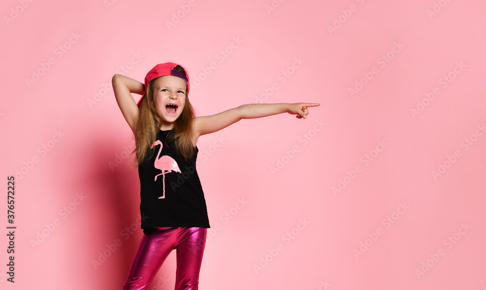 education, school and gesture concept - cute little girl pointing to the side education, school and gesture concept - cute little girl pointing to the side