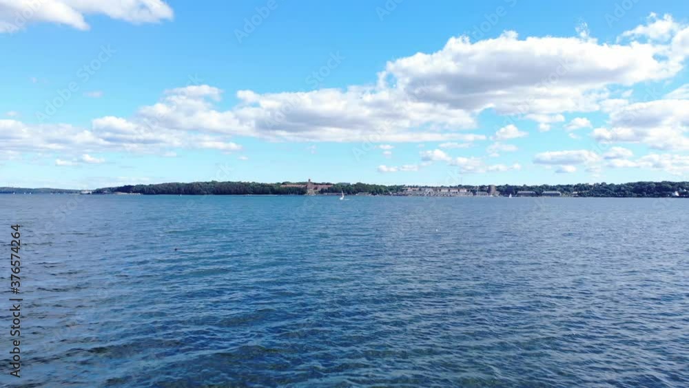 flensburg fjord in germany, clear and calm sea water. sunny summer holiday sky with beautiful clouds. amazing colorful scenery. Pacification and travel to germany concept concept. Copy space flensburg fjord in germany, clear and calm sea water. sunny summer holiday sky with beautiful clouds. amazing colorful scenery. Pacification and travel to germany concept concept. Copy space
