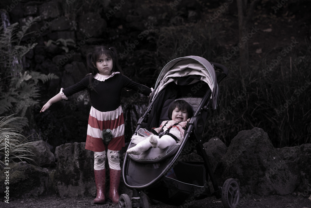 Naklejka premium creepy sisters scary on the dark
