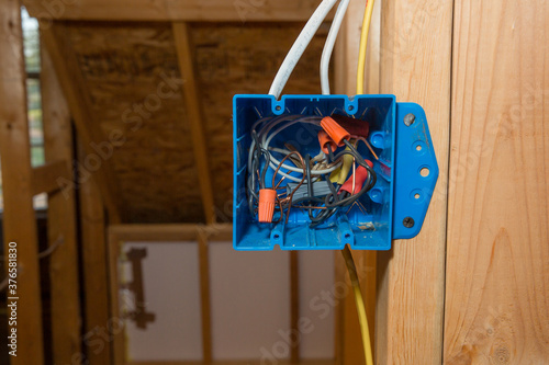 2-Gang Blue Plastic Switch Outlet Electical Box on new home construction framing