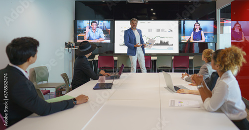 diversity business people having video conference in meeting room photo