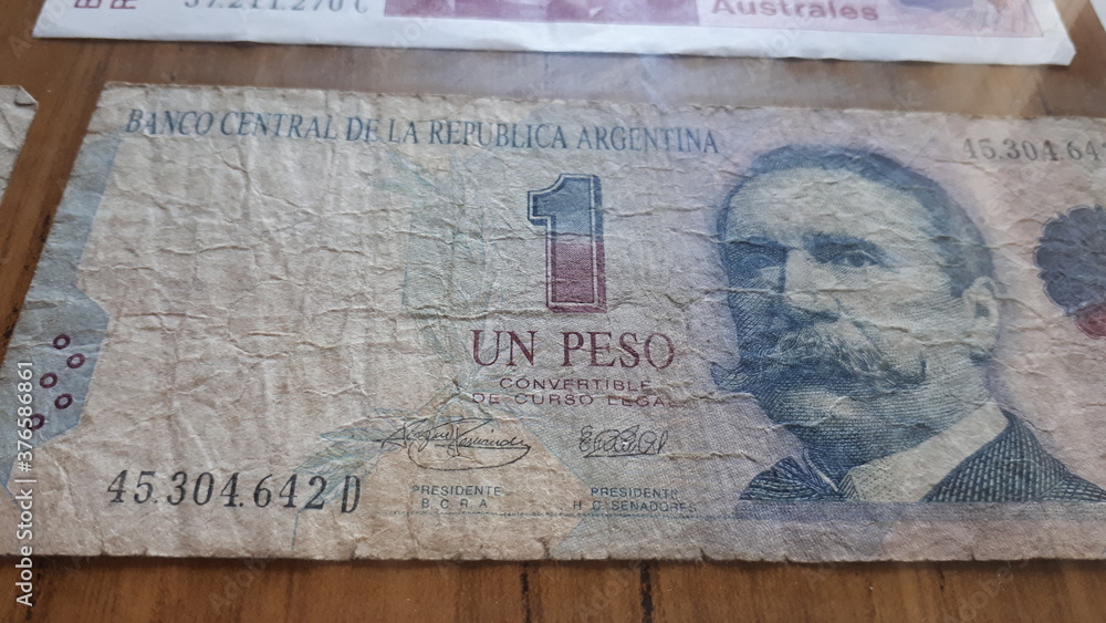Fototapeta premium argentine old money pesos in table