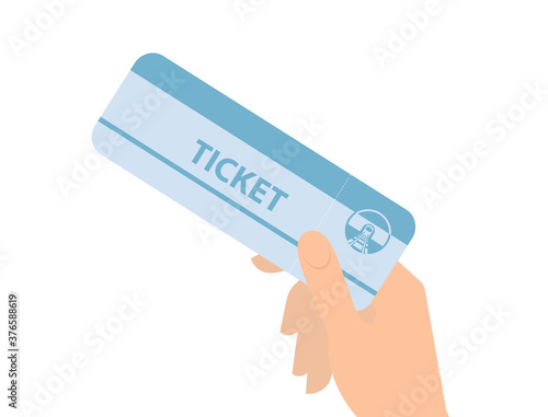 Someone who is holding a train ticket