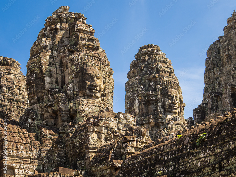 Sacred faces of ancient Cambodian kings in Bayon temple of Angkor