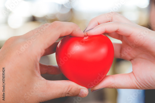 Woman hold red heart
