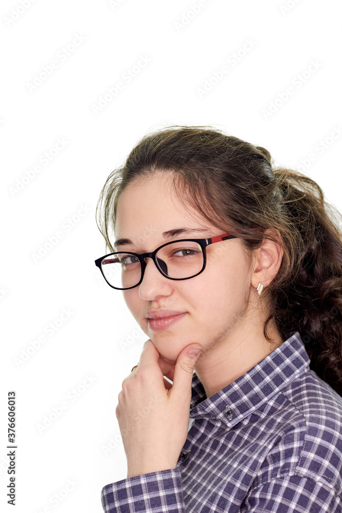 young girl in a shirt on a white background, difficult choice of profession
