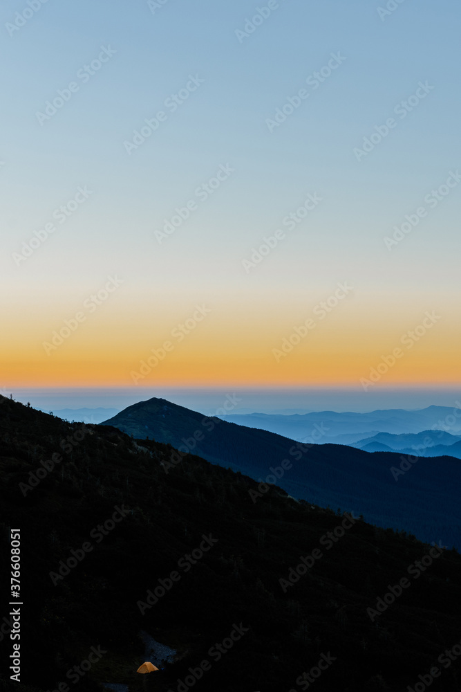 Sunrise in the Carpathians near Mount Pip Ivan, the saddle of Montenegro, a camping town in the saddle.