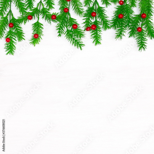 Christmas decorations on white wooden background with blank space for text