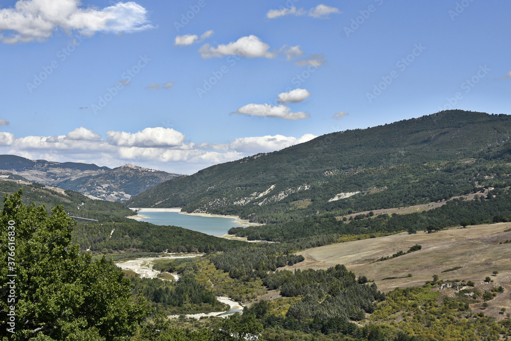 Panoramic view of a lake in the mountains of the Basilicata region, Italy.