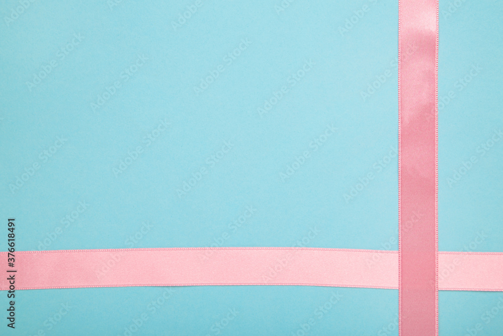 Pink ribbon on blue background, design element Pink ribbon on blue background, design element