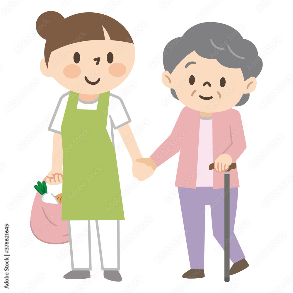 高齢女性の買い物に付き添う介護士