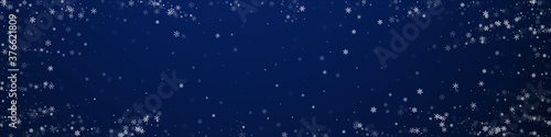 Beautiful snowfall Christmas background. Subtle fl