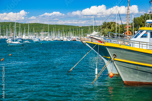 Waterfront and old ships in the harbor in town of Punat on the island of Krk, Adriatic coast, Croatia
 photo