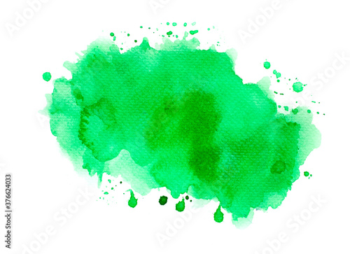 green watercolor splashes of paint on paper background.