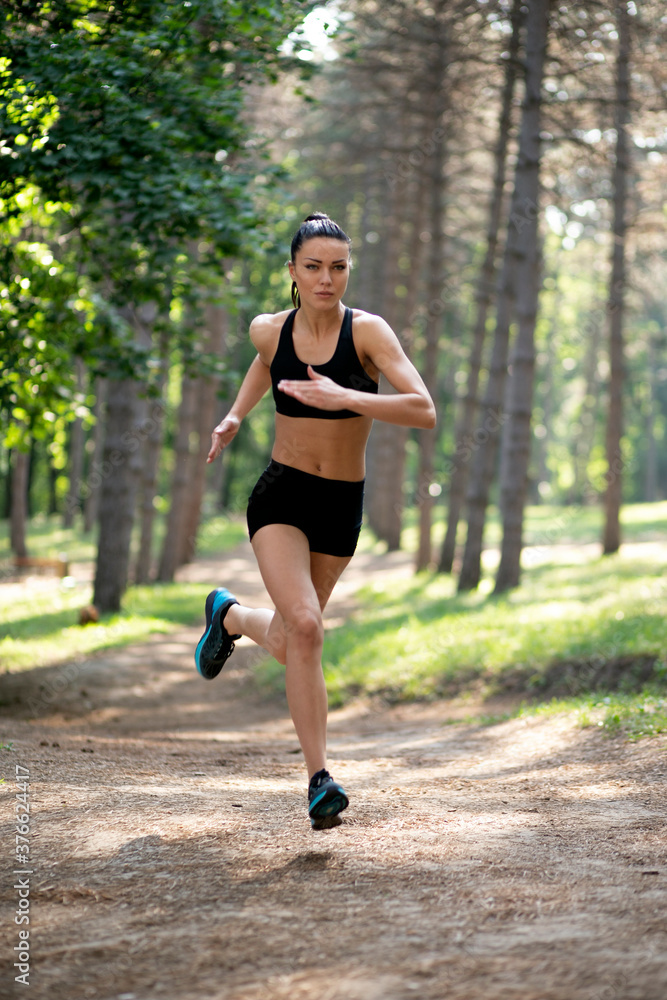 Active fir girl running single in park, summer, healthy, perfect tone body, fit. Workout in the park. Active fir girl running single in park, summer, healthy, perfect tone body, fit. Workout in the park.