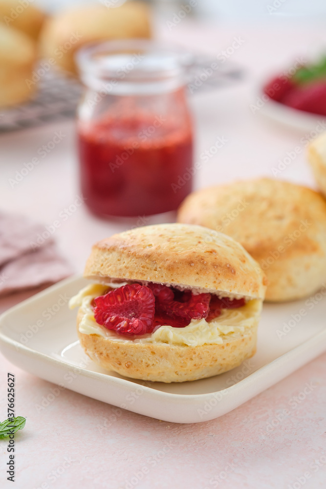 Traditional British Scones with clotted cream, raspberry jam. Scones with raspberry jam Traditional British Scones with clotted cream, raspberry jam. Scones with raspberry jam