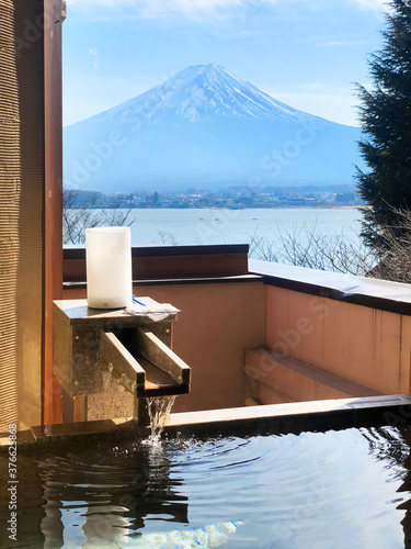 Outdoor hot-spring bath with the beautiful view of Mountain Fuji and Lake Kawaguchiko in Japan