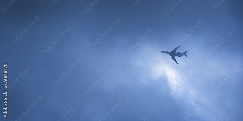 Airplane flying in the strom