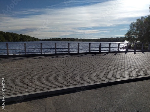 City embankment Semenovskaya lake in Murmansk photo