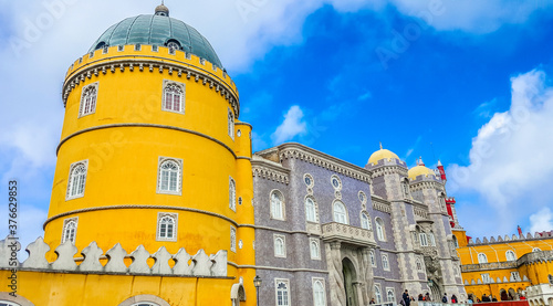 Фотография The Pena Palace, a romanticist castle in Sao Pedro de Penaferrim, in the municipality of Sintra, on the Portuguese Riviera