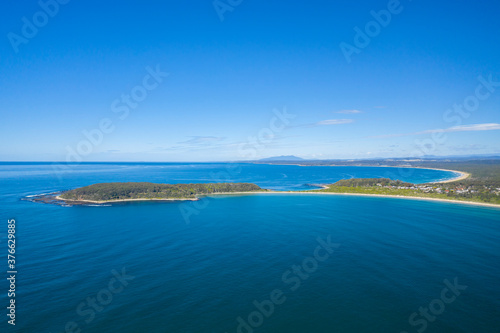 Panoramic aerial view of Broulee Island at Broulee near Batemans Bay on the New South Wales South Coast, Australia 
