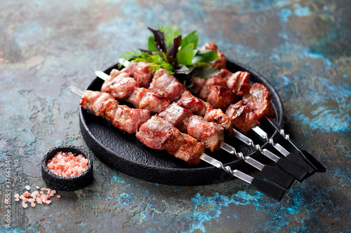 Obraz na plátně Grilled meat shashlik skewers, selective focus